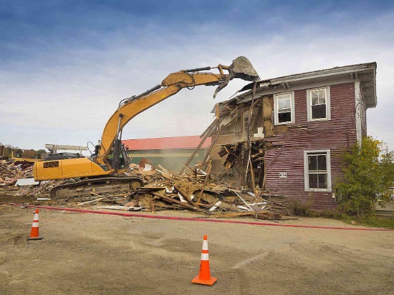 Home demolished by crane